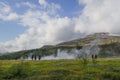 Haukadalur, Iceland: Visitors wait for the active Strokkur geyser to erupt