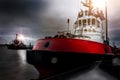 Haulier ships in an harbor in the evening composition Royalty Free Stock Photo