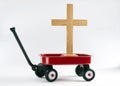 Little Red Wagon and the Cross Royalty Free Stock Photo