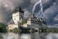 Haunted castle Karlstejn in storm Royalty Free Stock Photo