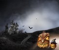 Haunted Hause with pumpkins the road ,dark scary cemetery smoke light gray on a black background Halloween horror concept Royalty Free Stock Photo