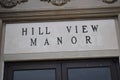 Hill View Manor sign post