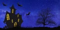 Haunted House  silhouetted againist the evening sunset on Halloween night Royalty Free Stock Photo