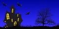 Haunted House  silhouetted againist the evening sunset on Halloween night Royalty Free Stock Photo