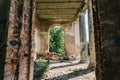 Haunted mansion, abandoned ancient building inside interior with arch windows Royalty Free Stock Photo