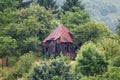 Haunted ruined house on a heel in forest