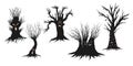 Haunted tree silhouettes with glowing eyes and creepy faces