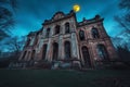 Haunting old mansion illuminated by a ghostly moonlight in a decaying forest at twilight Royalty Free Stock Photo