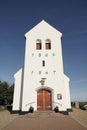 Haurvig Kirke on sunny day with blue sky, Jutland, Denmark