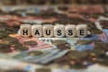HAUSSE - image with words associated with the topic STOCK EXCHANGE, word cloud, cube, letter, image, illustration Royalty Free Stock Photo