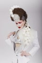 Haute Couture. Extravagant Woman in Cyber Costume and Theatrical Hair-do Royalty Free Stock Photo