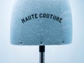 Haute Couture signage on mannequin made from fine luxury garment textile