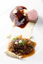 Haute cuisine, grilled veal fillet steak,veal tail with a sauce of port, morels, lentils Royalty Free Stock Photo