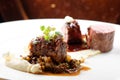 Haute cuisine, grilled veal fillet steak,veal tail with a sauce of port, morels, lentils