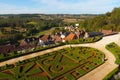 Hautefort village architecture and Heutefort castle garden Dordogne France Royalty Free Stock Photo