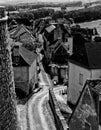 Hautefort walls and Hautefort village architecture Dordogne France in black and white Royalty Free Stock Photo