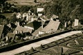 Hautefort village architecture and Heutefort castle garden Dordogne France in black and white Royalty Free Stock Photo