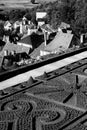 Hautefort village architecture and Heutefort castle garden Dordogne France in black and white Royalty Free Stock Photo