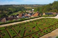 Hautefort village architecture and Heutefort castle garden Dordogne France Royalty Free Stock Photo