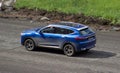 Haval Fx7 rides on the road Royalty Free Stock Photo