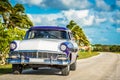 American blue white 1956 vintage car parked on the street near the beach in Havana Cuba - Serie Royalty Free Stock Photo