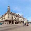 HAVANA, CUBA - APRIL 1, 2012: Bicycle taxi passing Great Theater