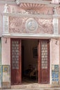 HAVANA, CUBA - APRIL 2, 2012: The entrance to the old building d