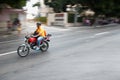 Havana, Cuba - April 13, 2017: A man drives a motorcycle through the streets of Havana