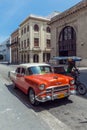 HAVANA, CUBA - APRIL 1, 2012: Orange Chevrolet vintage car Royalty Free Stock Photo