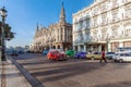 HAVANA, CUBA - APRIL 1, 2012: Three vintage cars in front of Gr Royalty Free Stock Photo