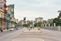HAVANA, CUBA - AUGUST 26, 2017: Street scene with cocotaxi and colorful buildings in Old Havana, Cuba Royalty Free Stock Photo