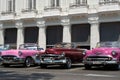 Havana, Cuba - August 25 2018: On Agramonte street next to the Gran Hotel Manzana Kempiski in Old Havana there are many classic ca Royalty Free Stock Photo