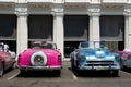 Havana, Cuba - August 25 2018: On Agramonte street next to the Gran Hotel Manzana Kempiski in Old Havana there are many classic ta Royalty Free Stock Photo