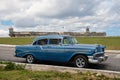 Chevrolet BelAir 1956 sedan in Havana, Cuba in front of Morro Castle