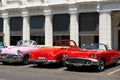 Havana, Cuba - August 25 2018: There are many classic tourist taxis parked on Agramonte street next to the Gran Hotel Manzana Kemp Royalty Free Stock Photo