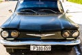 Black classic American car on the streets of Havana, tourist attraction Royalty Free Stock Photo