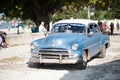 A blue classic car in Cuba