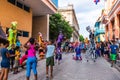 Havana / Cuba - 04.16.2015: Colorful stilt walkers dancing during the International Festival of Dance in Urban Landscapes