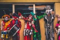 Havana / Cuba - 04.16.2015: Colorful stilt walkers resting against a wall during the International Festival of Dance in Urban