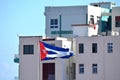 Havana Cuba - Cuban flag in the wind on a rooftop in the city centre