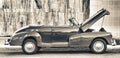 Black and white tone of old convertible car parked in a street o Royalty Free Stock Photo