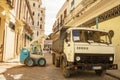 Excavator and truck work on the reconstruction of the center of