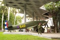 Historic military plane with guard soldier