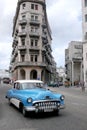 HAVANA, CUBA - 20 December 2016 : Old American cars are still a common sight in the backstreets of Havana, Cuba. Many are used as