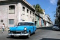 HAVANA, CUBA - 20 December 2016 : Old American cars are still a common sight in the backstreets of Havana, Cuba. Many are used as