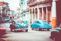 HAVANA, CUBA - DECEMBER 10, 2019: Vintage colored classic american cars in Old Havana, Cuba Royalty Free Stock Photo