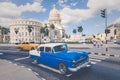 HAVANA, CUBA - DECEMBER 10, 2019: Vintage colored classic american cars in Old Havana, Cuba Royalty Free Stock Photo