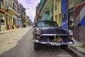 HAVANA, CUBA - 16 FEB, 2017. Black vintage classic American car, commonly used as private taxi parked in Old Havana street. Royalty Free Stock Photo