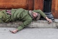 HAVANA, CUBA - FEB 22, 2016: Homeless man sleeping on the street in Old Havana