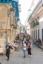Bar La Bodeguita del medio, on Obispo street. Tourists walking in a daily scene in Old Havana, on a sunny day. Havana, Cuba